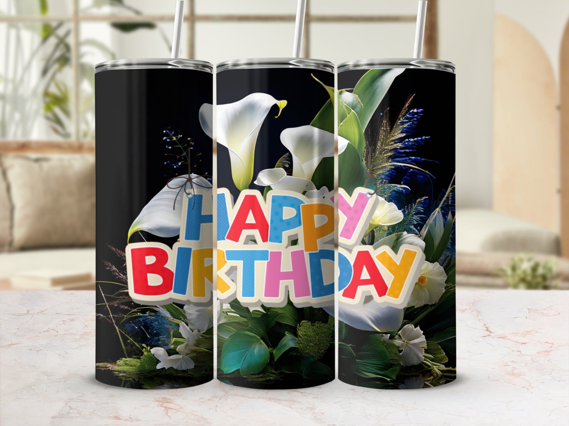 Black tumbler with "Happy Birthday" in colorful letters and floral accents.