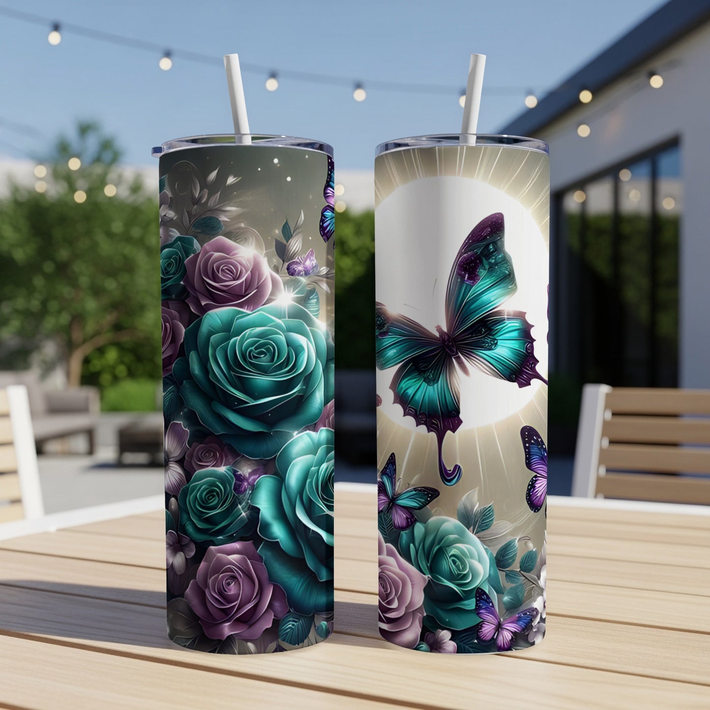 Two teal and purple rose tumblers with butterfly and moon designs.