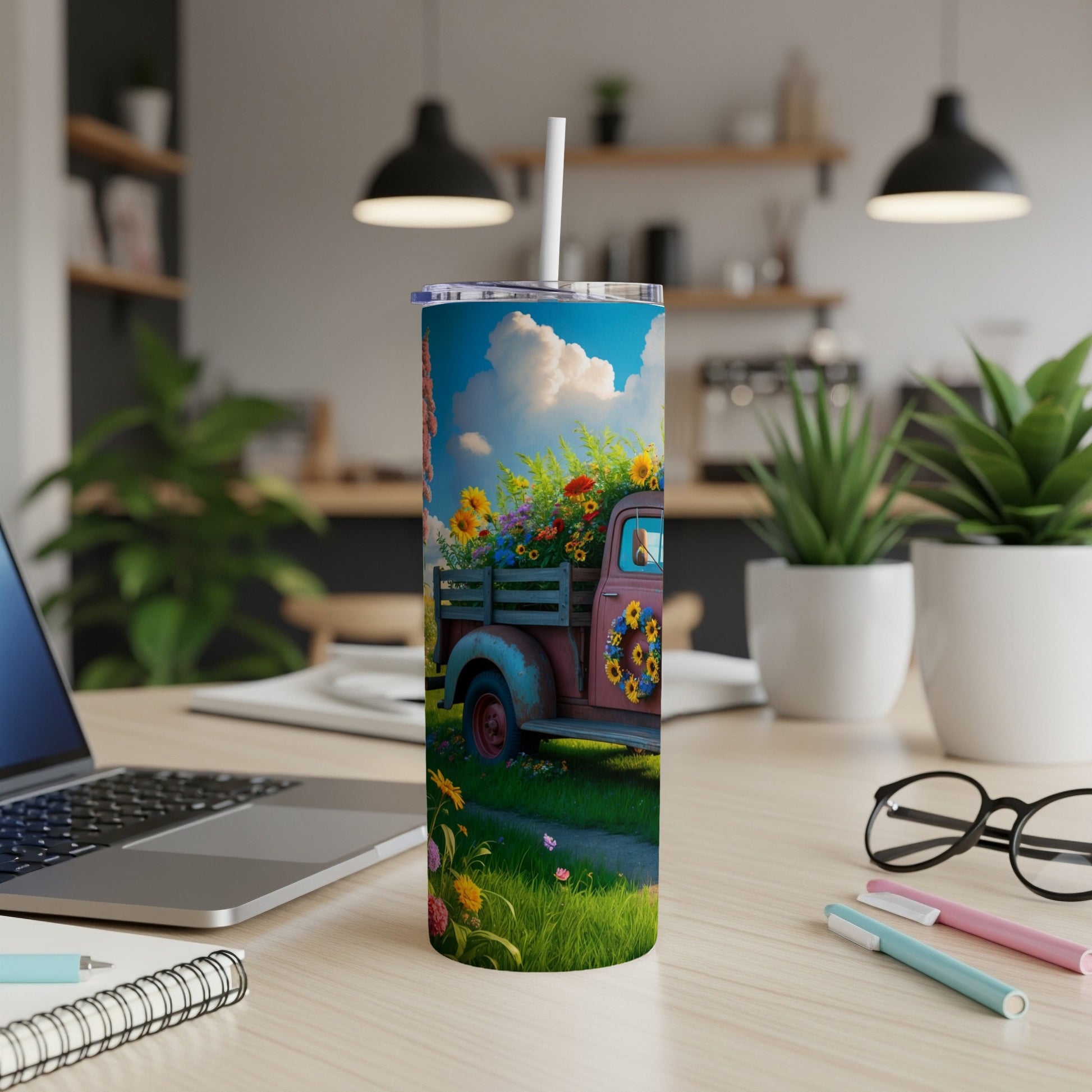 Vintage truck overflowing with sunflowers and daisies on a slim tumbler.