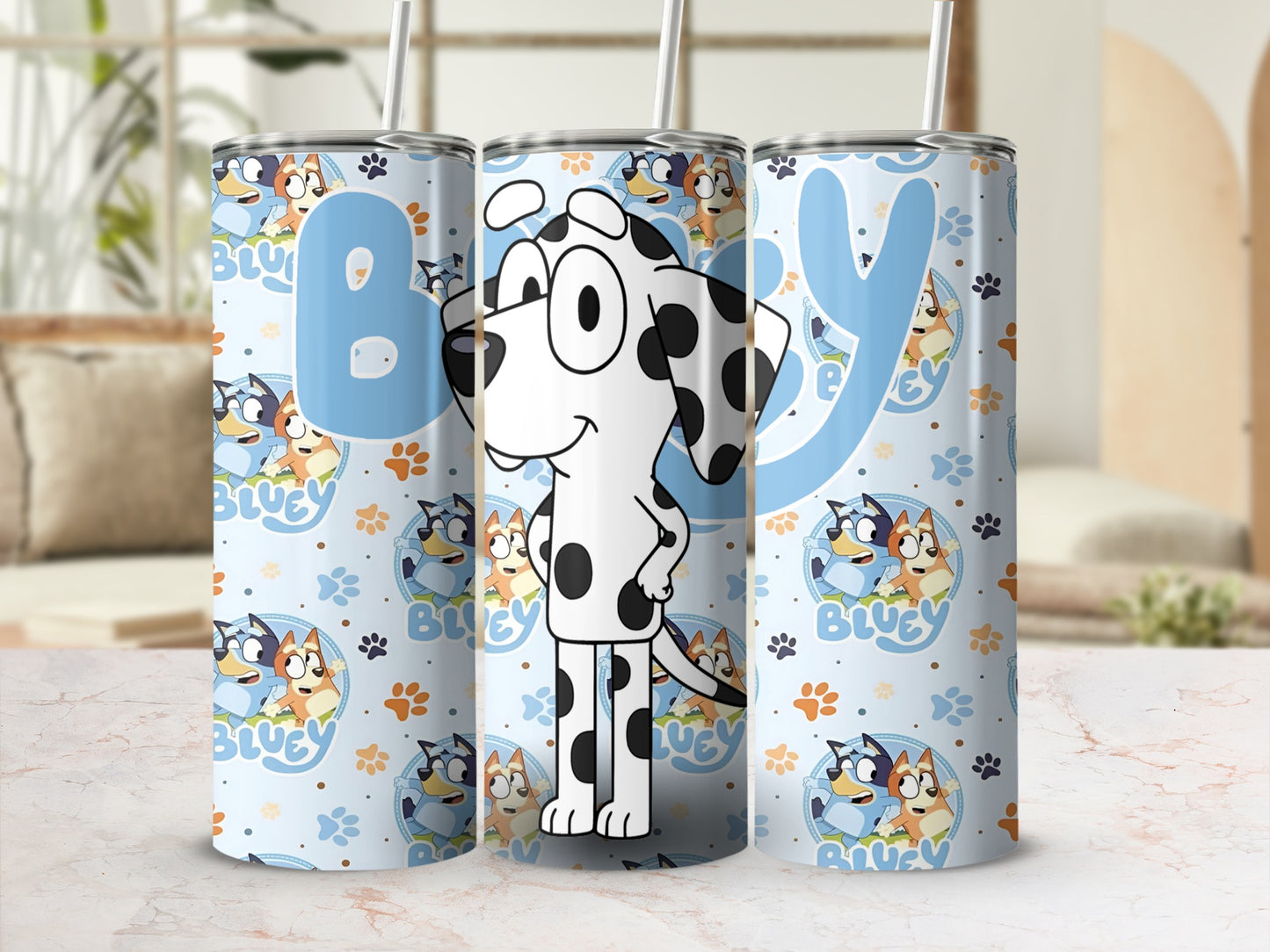 Bluey character tumbler with polka dots and repeating Bluey dog designs.