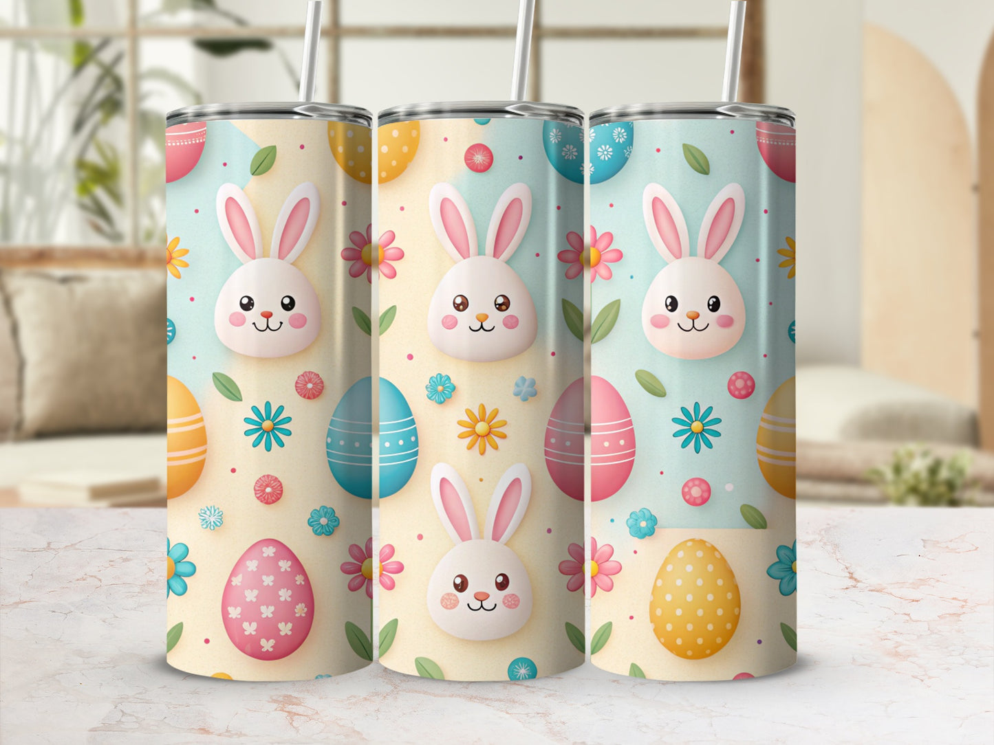 Three Easter-themed tumblers with bunnies and colorful eggs.