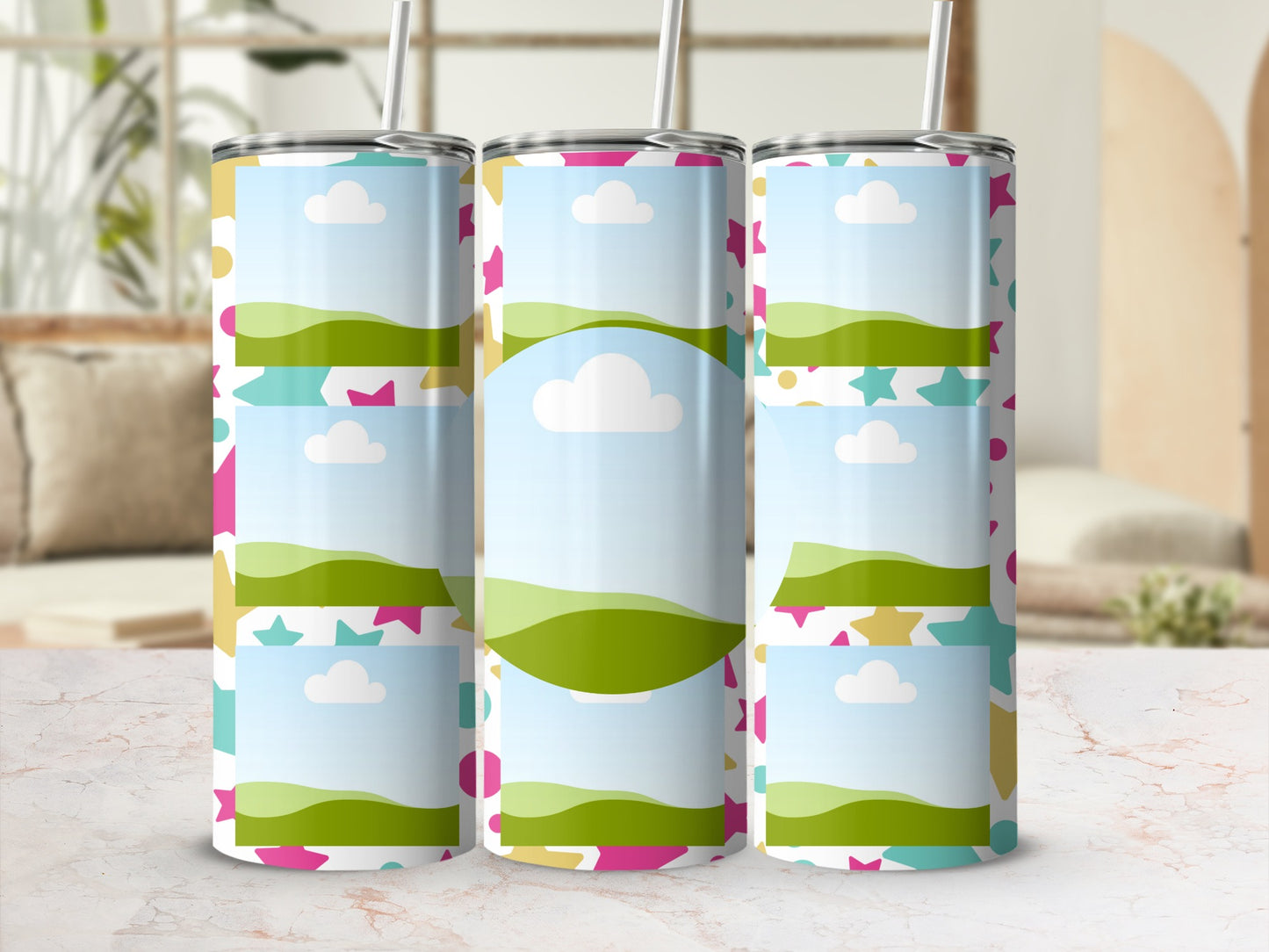 Three tumblers with a playful landscape and star pattern design.