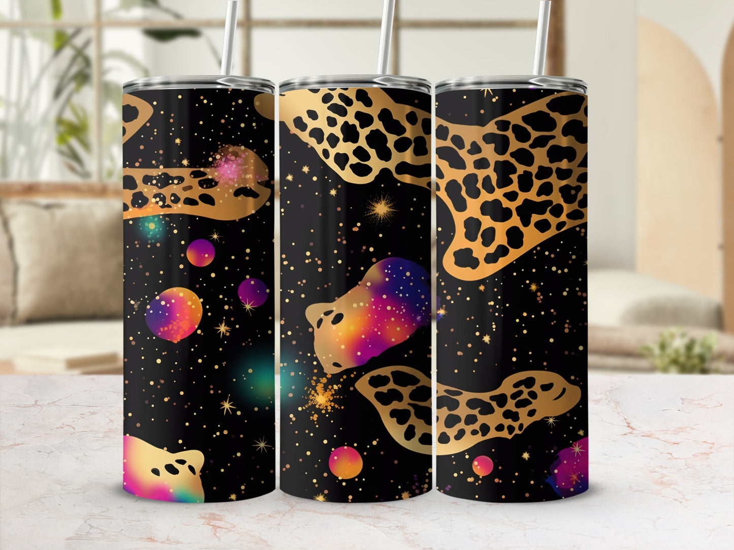 Black tumbler with leopard print, galaxy, and star patterns.