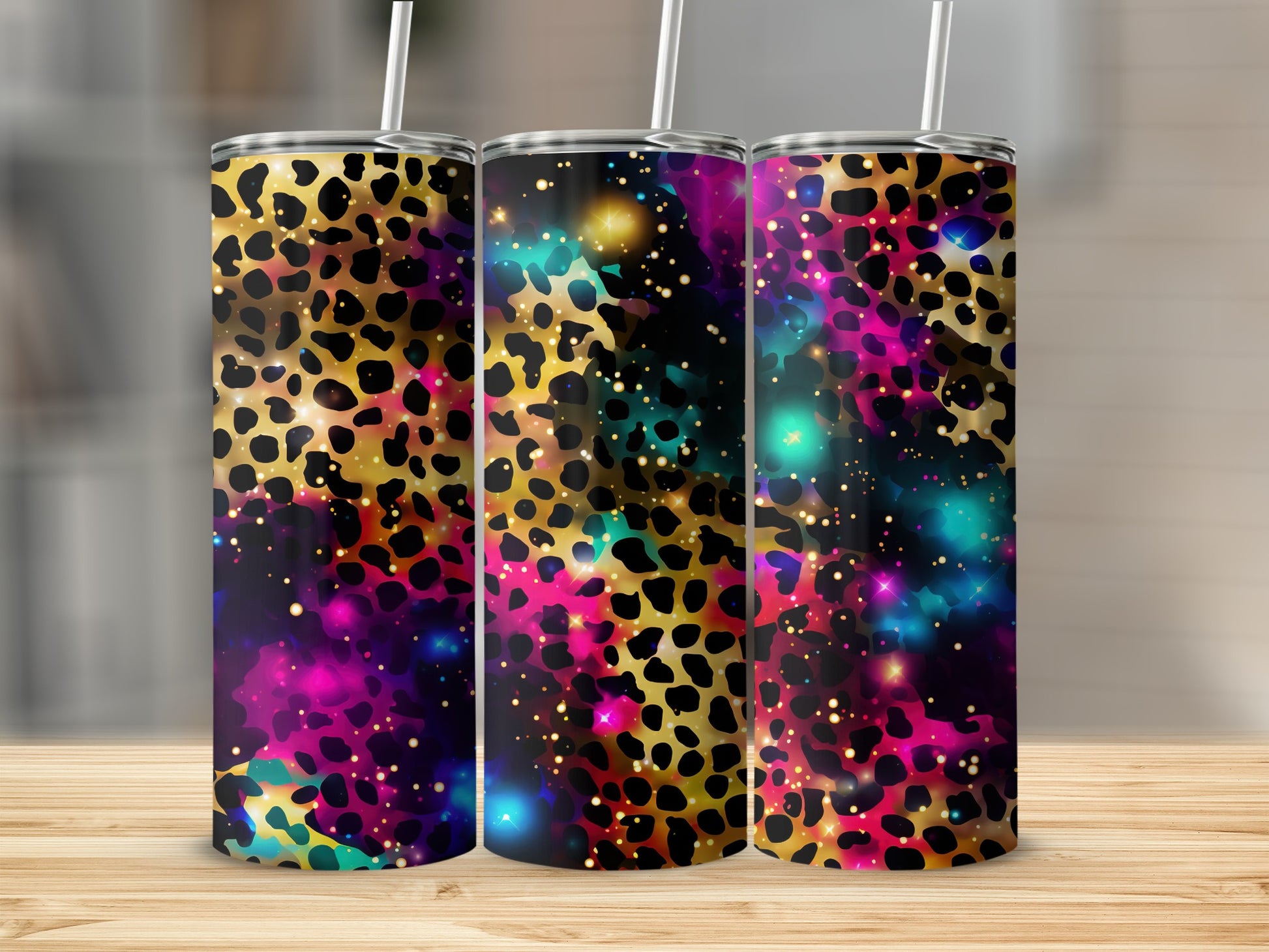 Three tumblers with leopard print and galaxy design.