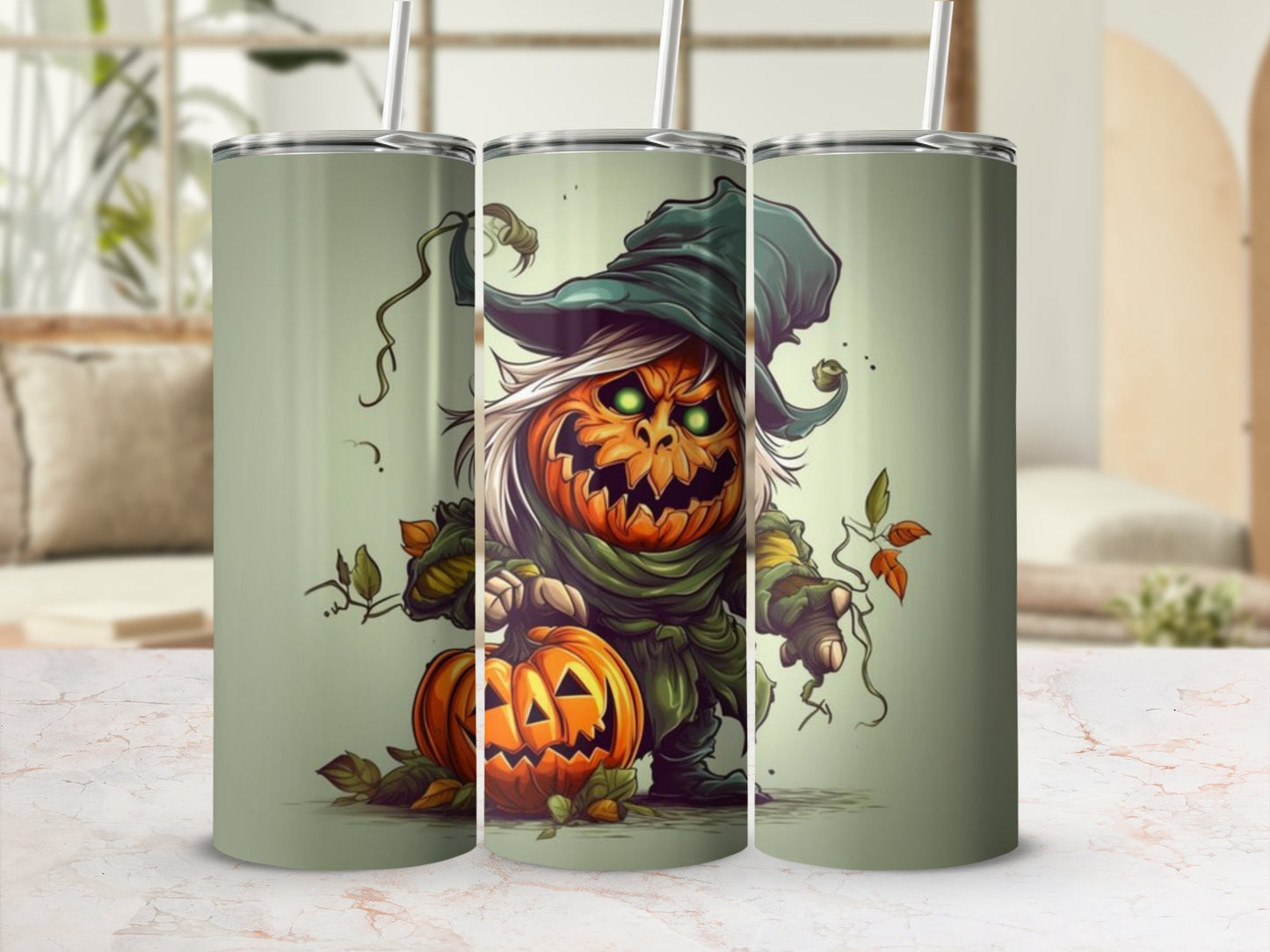 Three tumblers with a spooky jack-o'-lantern character and autumn leaves design.