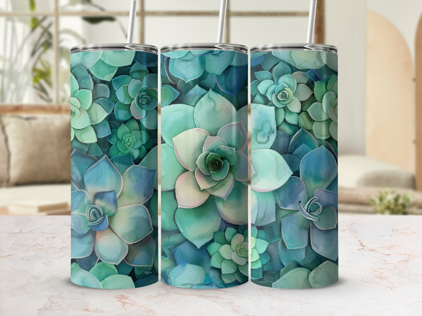 Three tumblers with a watercolor succulent pattern.