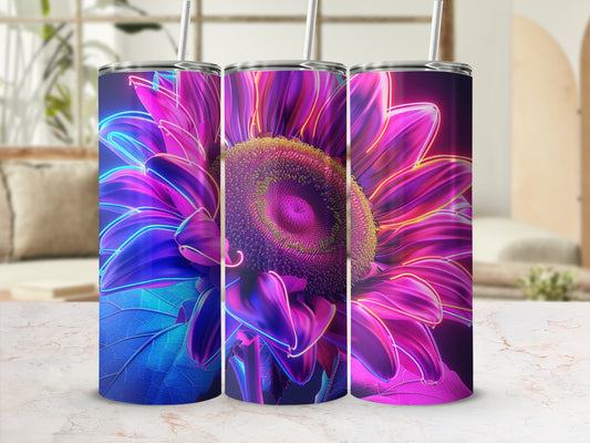 Tumbler with vibrant neon floral design and metallic blue leaves.