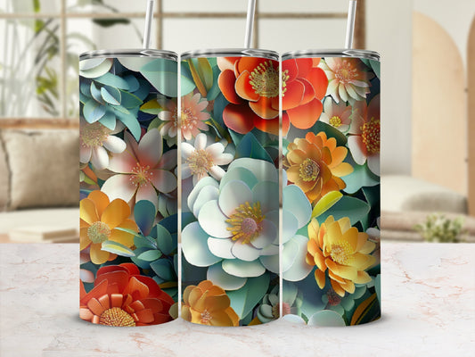 Three tumblers with a vibrant floral pattern featuring white, orange, and red flowers.