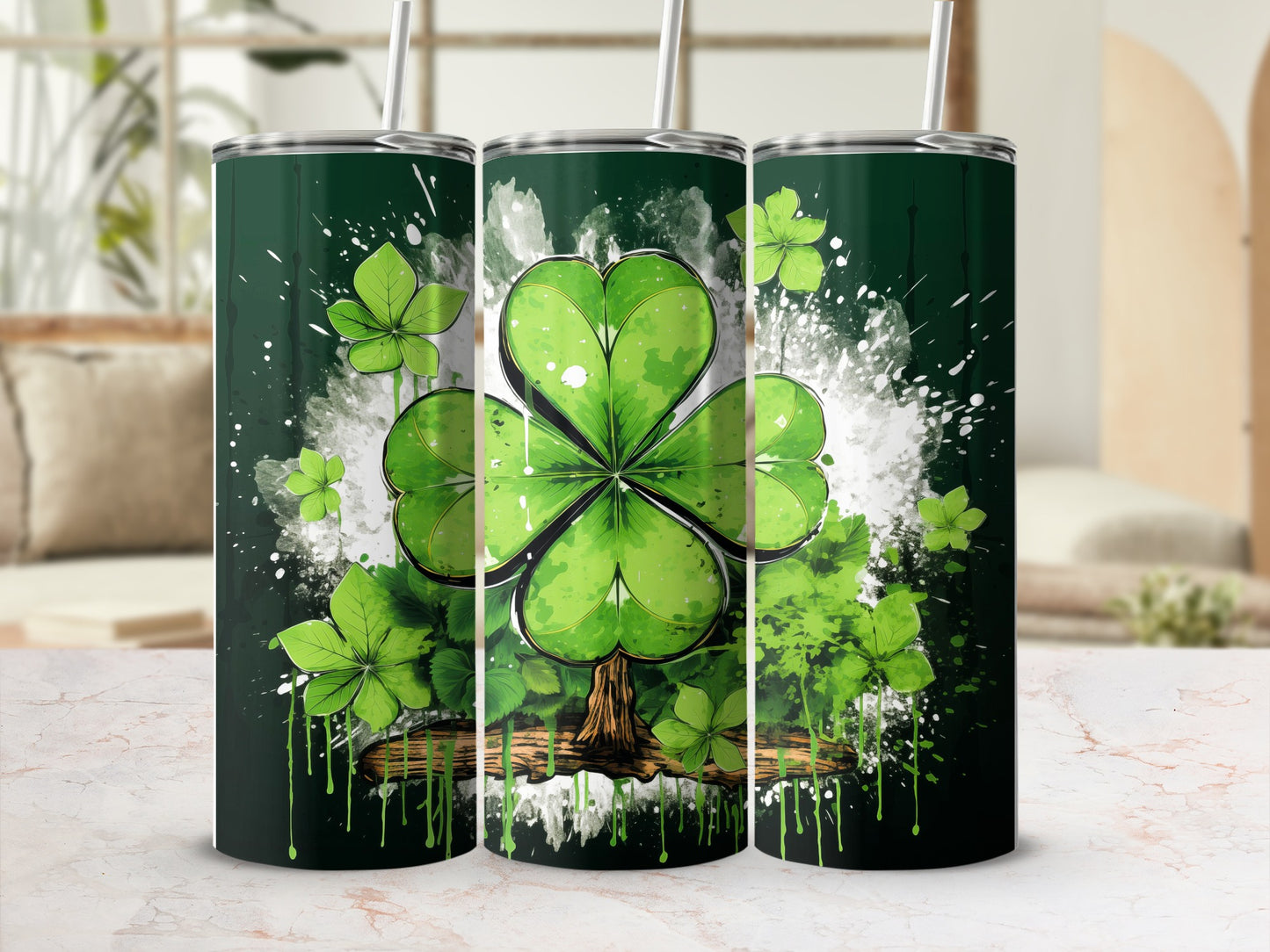 Green tumbler with shamrock and splattered paint design.
