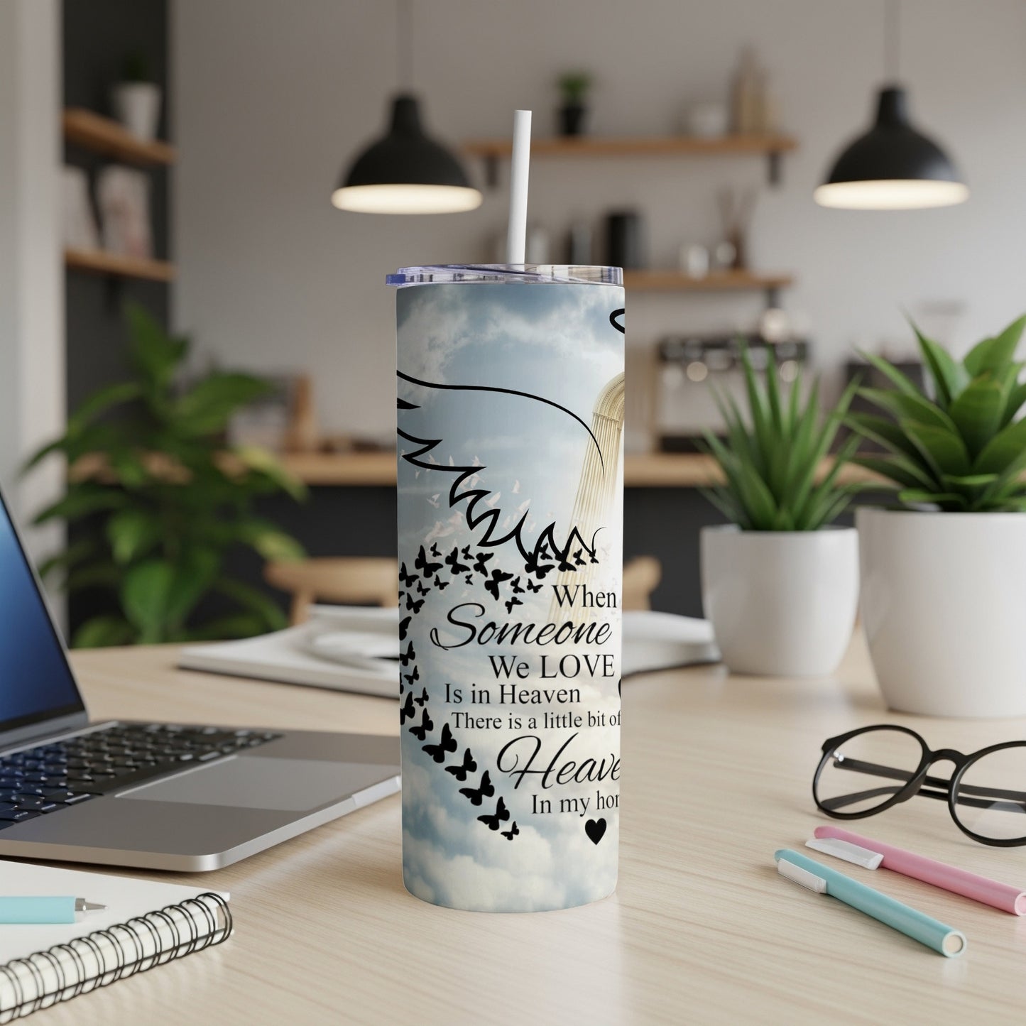 Tumbler with angel wings, butterflies, and quote "When Someone We Love Is in Heaven".