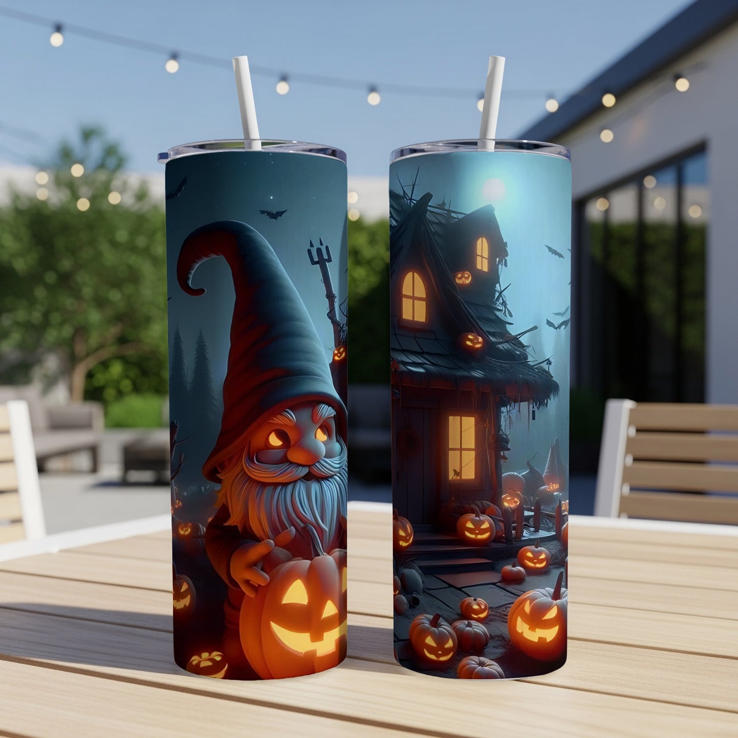 Two tumblers featuring Halloween art with a gnome and a haunted house surrounded by pumpkins.