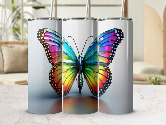 Three tumblers featuring a colorful butterfly design.