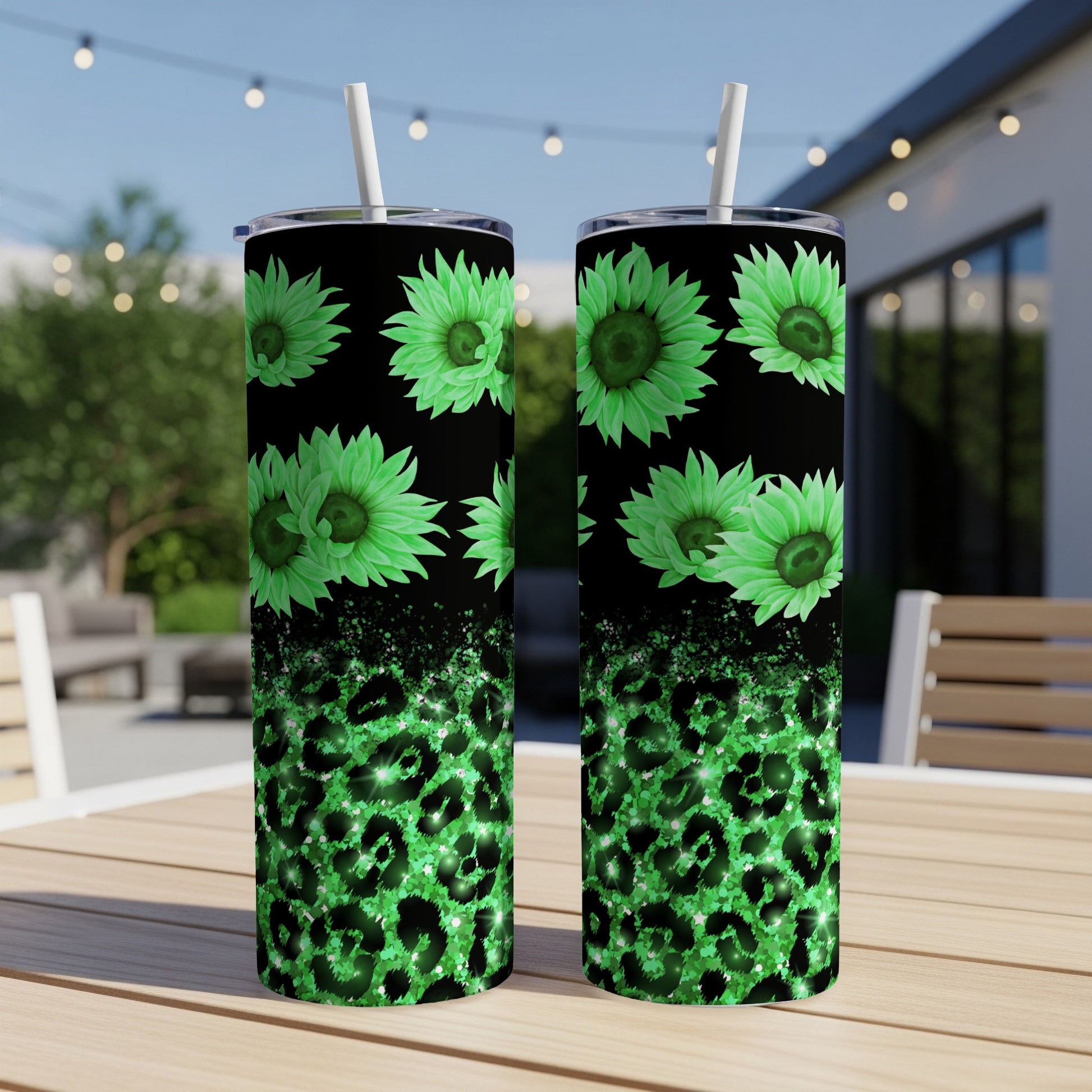 Green sunflowers and leopard print on black skinny tumblers.