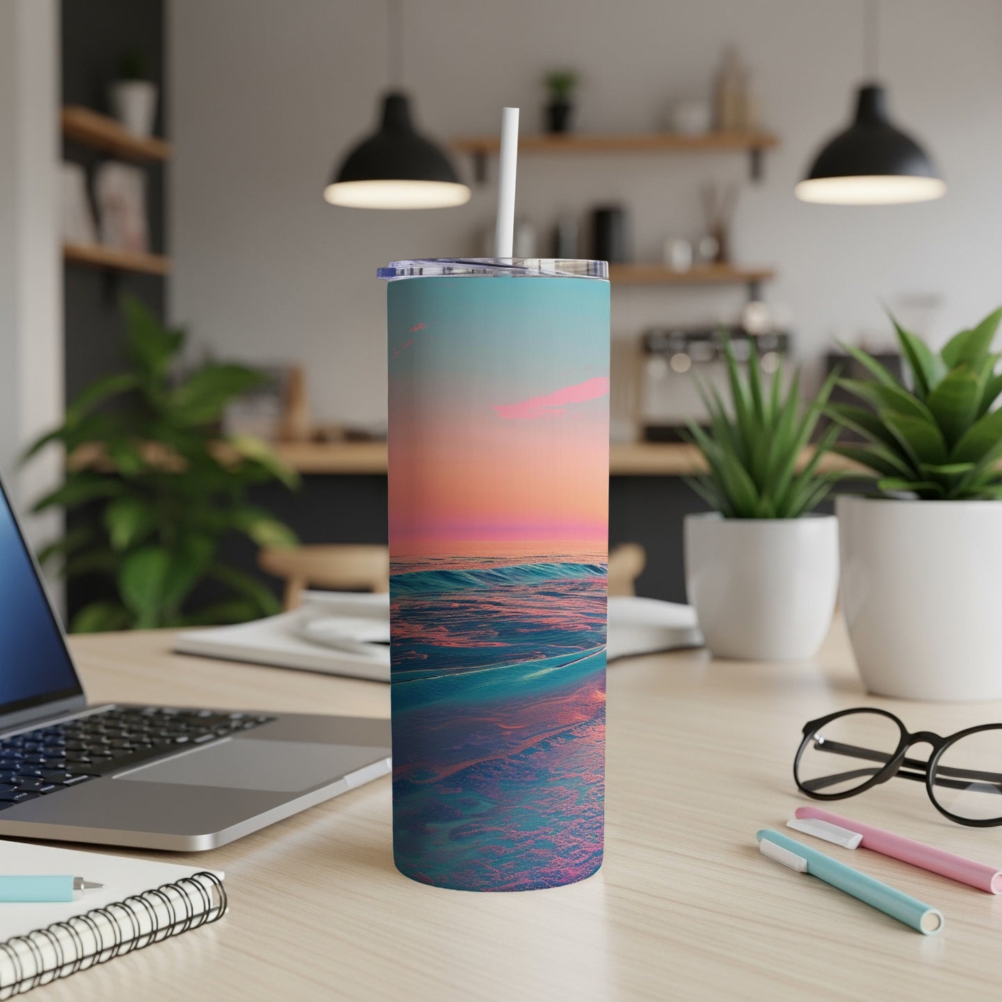 Gradient sunset ocean waves on a tall, narrow tumbler with straw.
