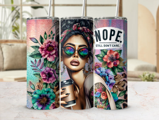 Woman with sunglasses and floral art on a tumbler with "Nope. Still Don't Care." text.