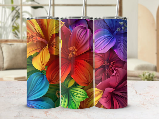 Three tumblers with vibrant, colorful floral designs in a gradient of rainbow hues.