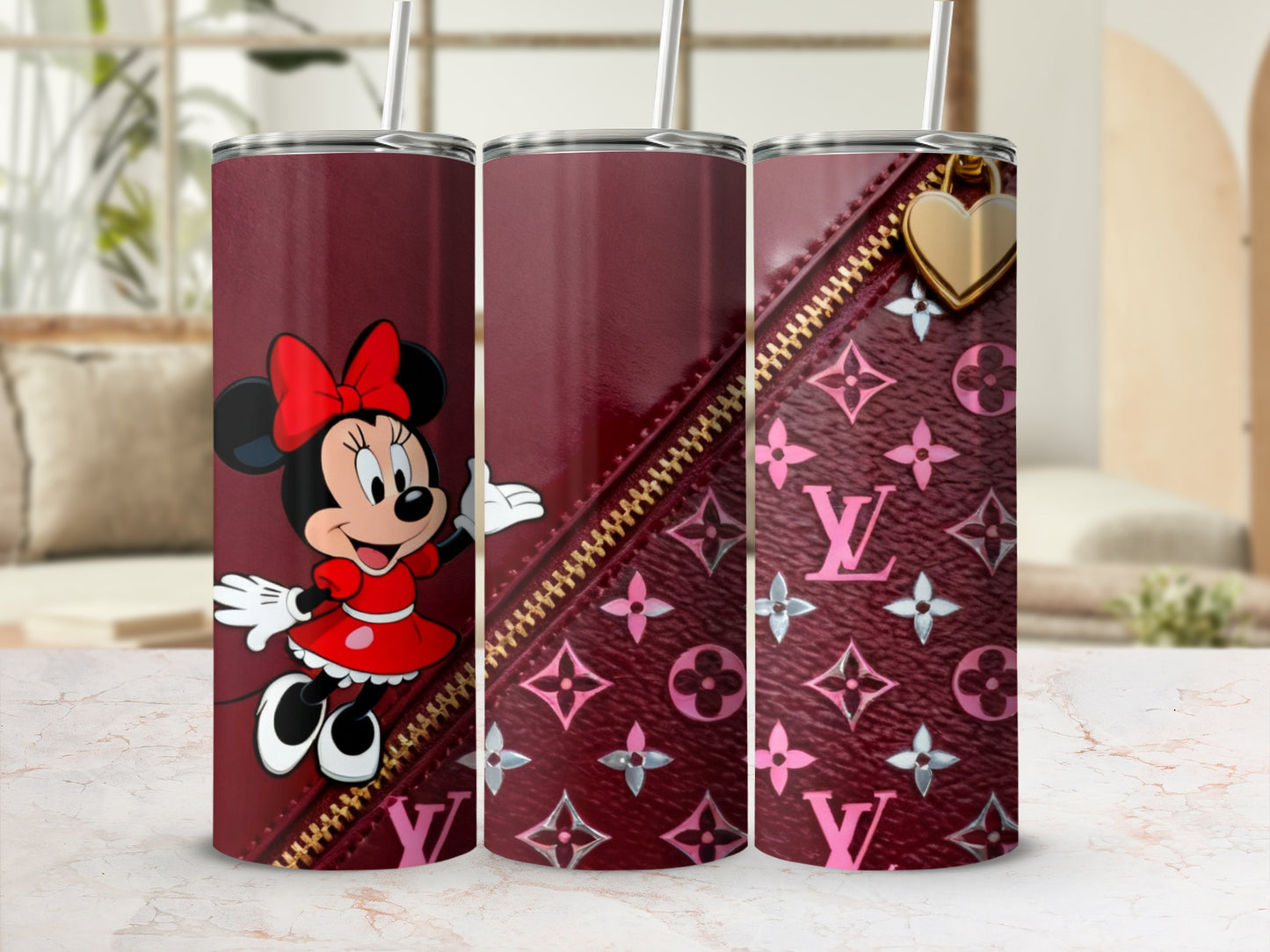 Minnie Mouse on burgundy tumbler with LV pattern and gold zipper detail.