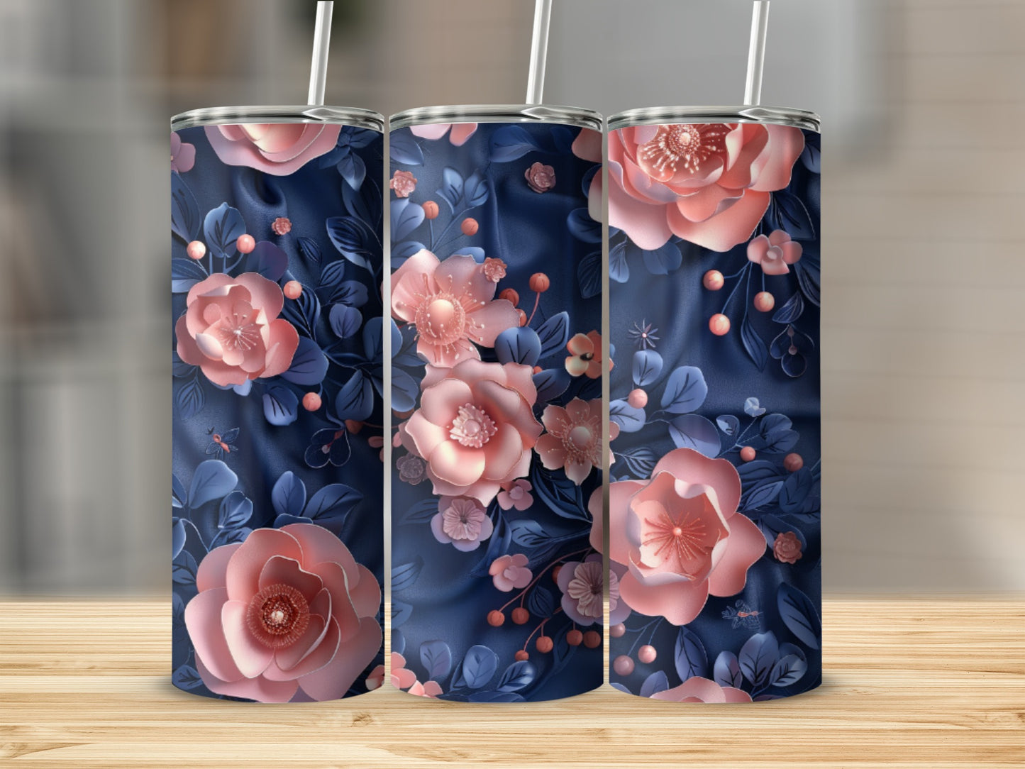 Three tumblers with a navy floral design, featuring pink flowers and leaves.