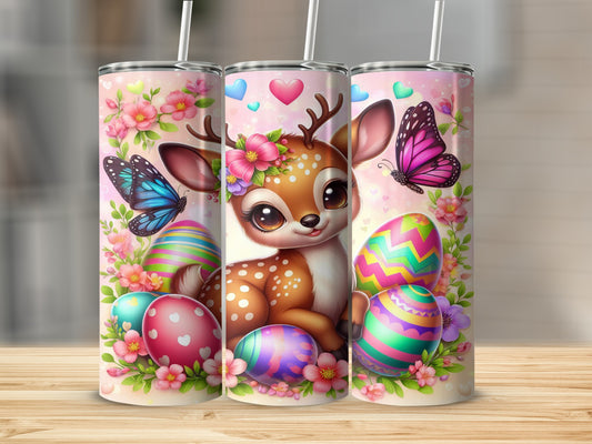 Easter tumbler with a fawn, butterflies, and decorated eggs.