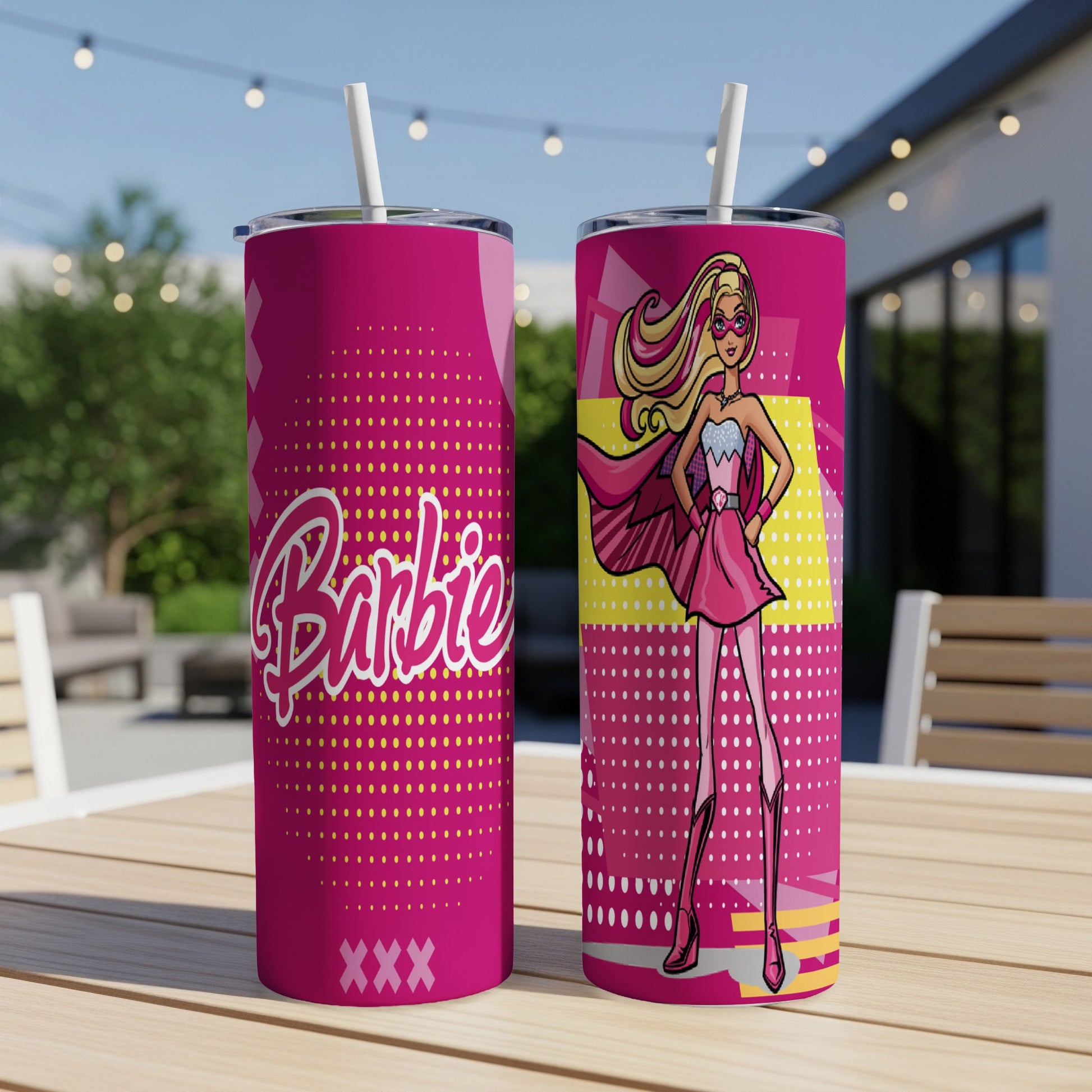 Barbie superhero tumbler with pink background and yellow accents.
