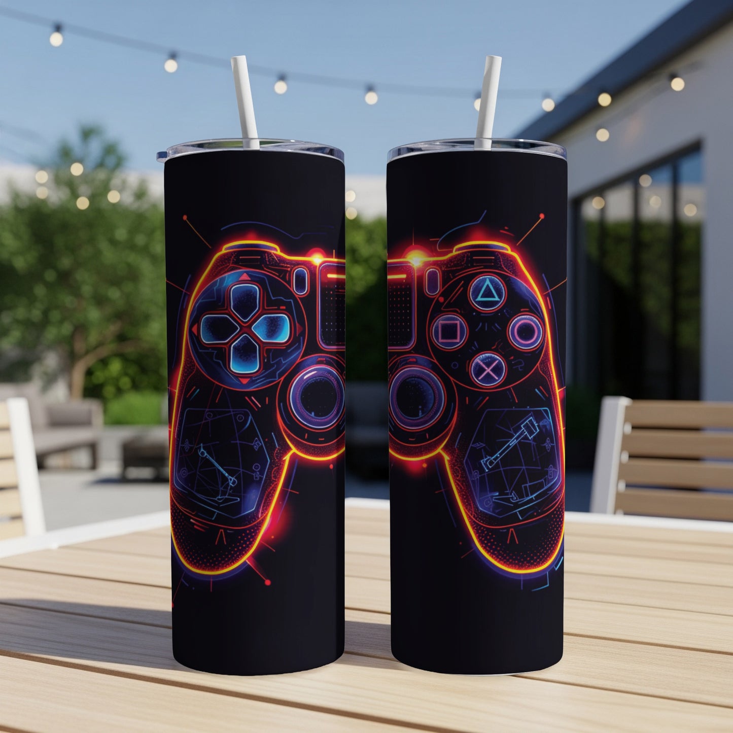 Black tumbler with neon blue and orange video game controller graphic.