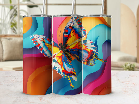 Tumbler with vibrant butterfly and colorful abstract wave pattern.