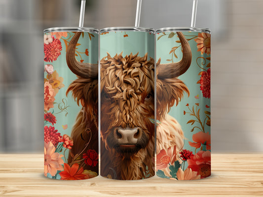 Highland cow and flowers design on three insulated tumblers.