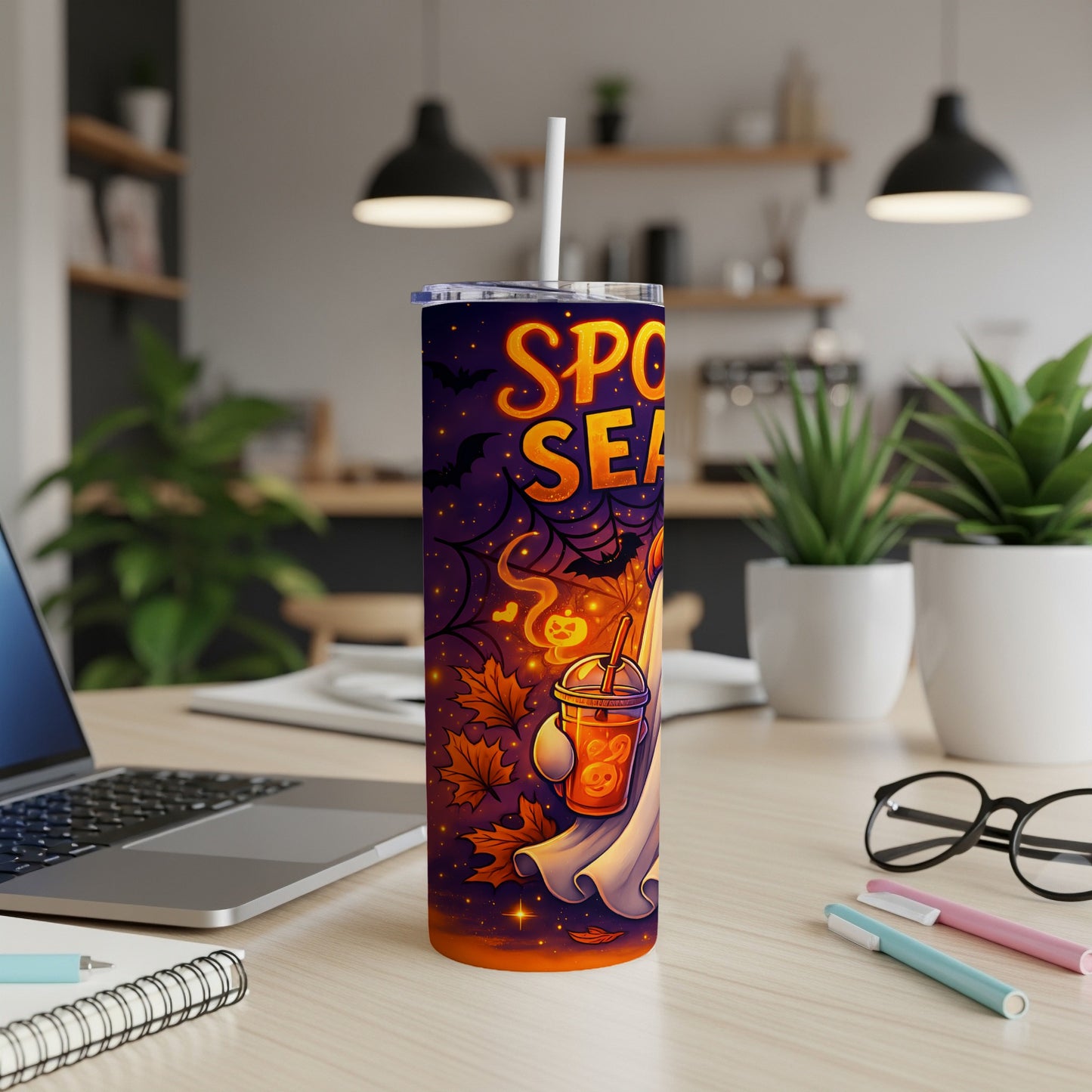 Halloween tumbler with "Spooky Season" text, ghost, bats, and fall leaves.