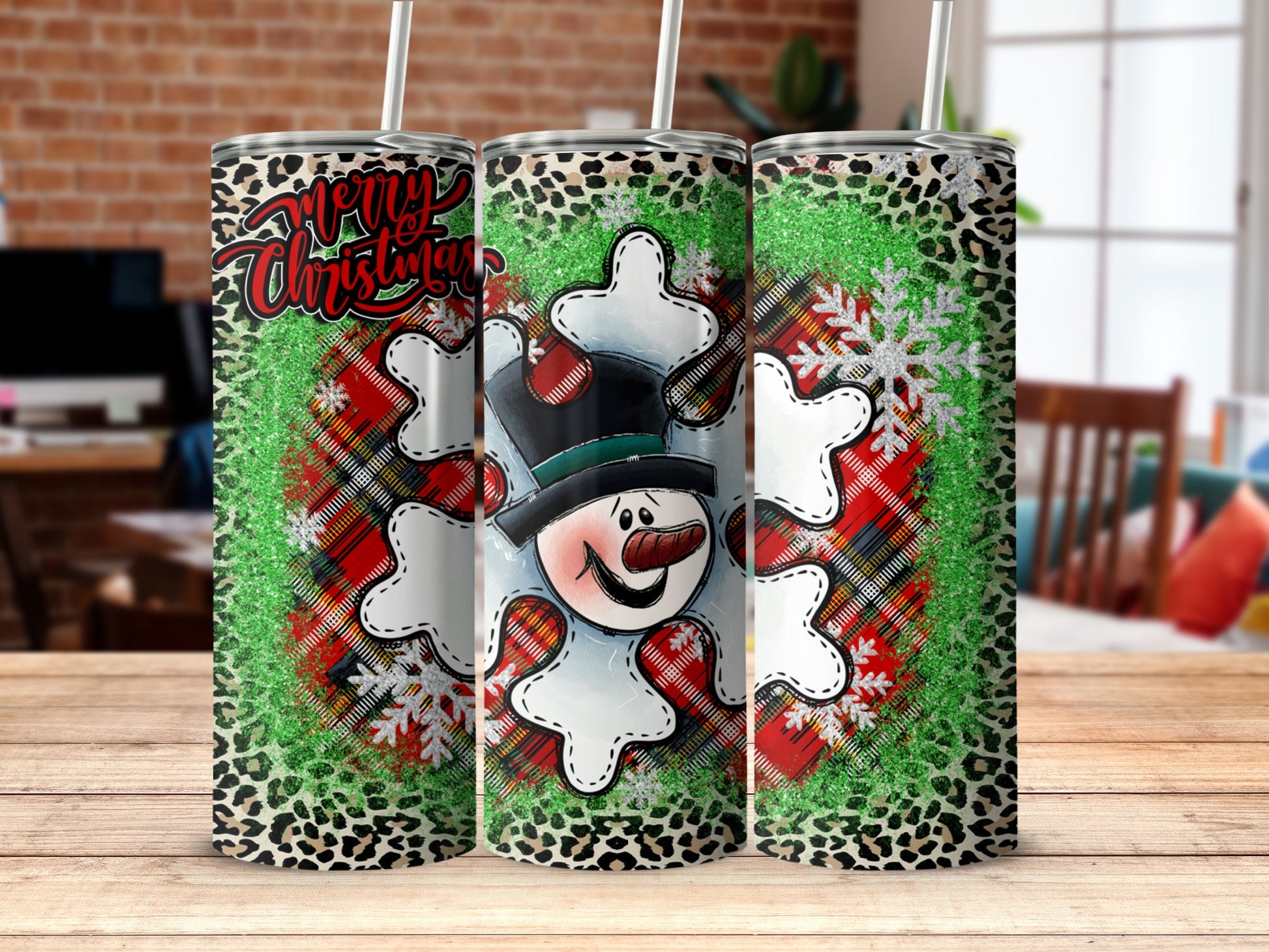 Tumbling snowman with plaid, leopard print, and snowflake design.