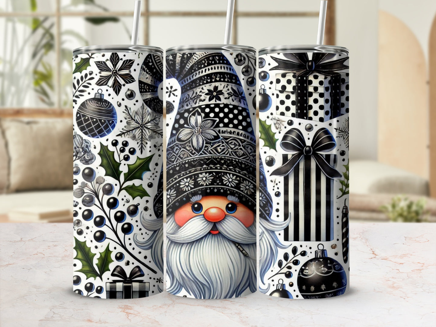 Three gnome-themed tumblers with black and white patterns and festive designs.