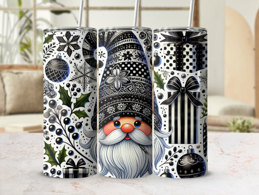 Three gnome-themed tumblers with black and white patterns and festive designs.