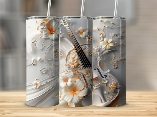 White tumbler with embossed floral and violin design.