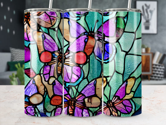 Three tumblers with stained glass butterfly design.