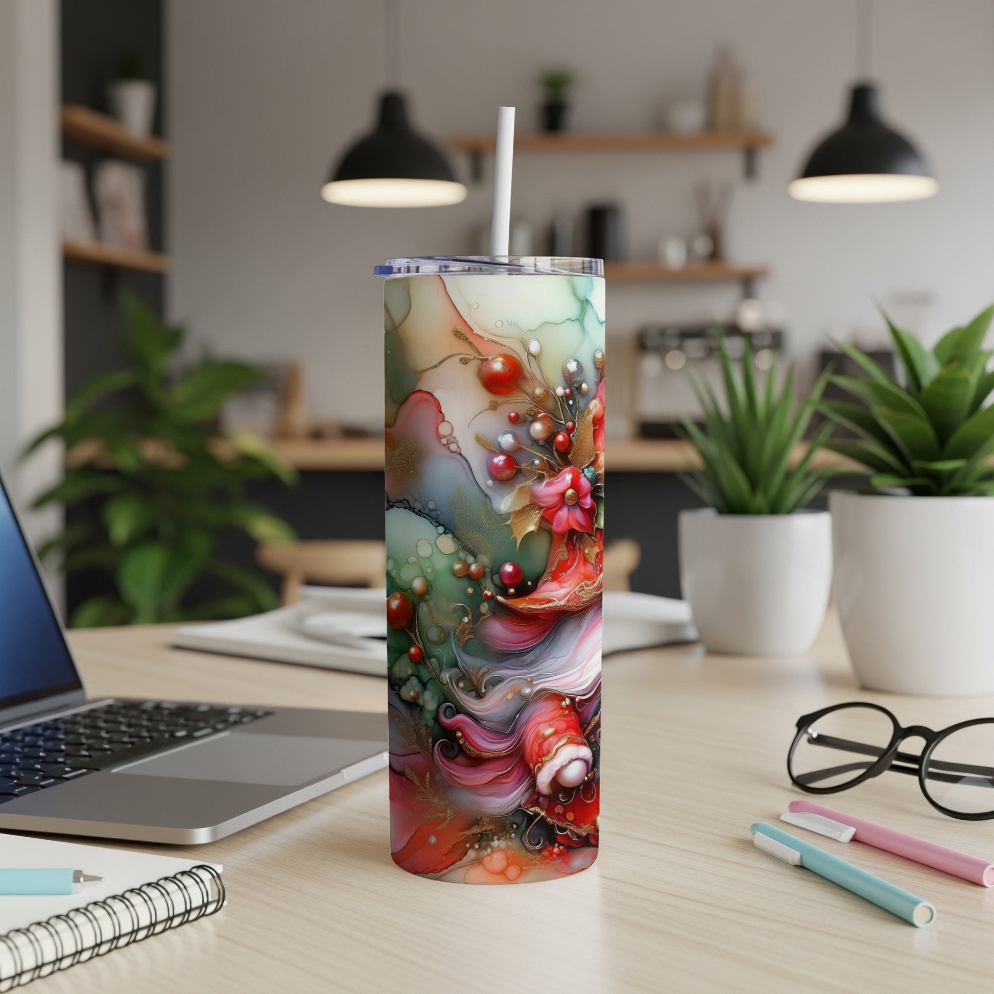 Colorful abstract art tumbler with Christmas motifs.