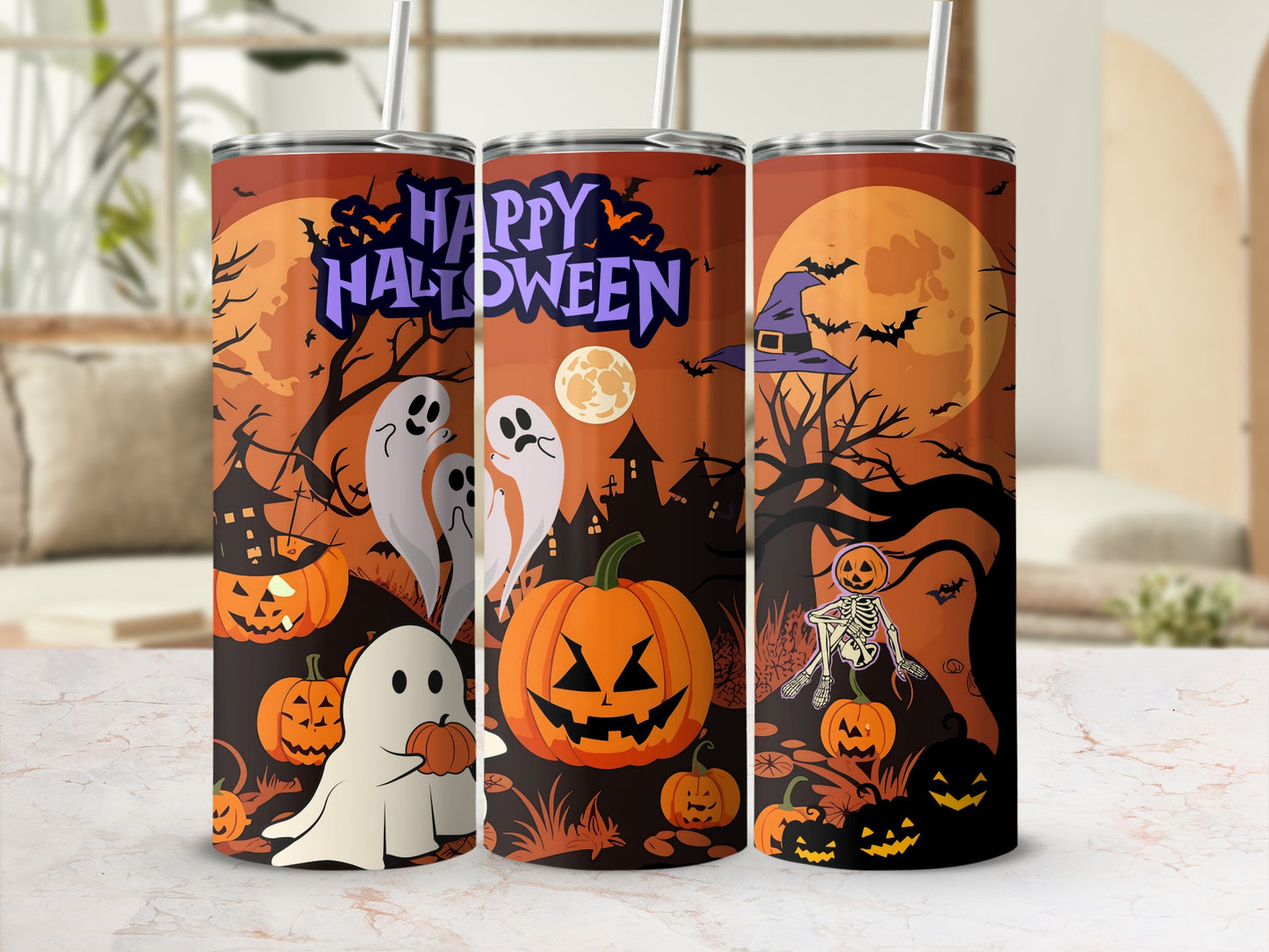 Three tumblers with Halloween graphics of ghosts, pumpkins, bats, and a skeleton.