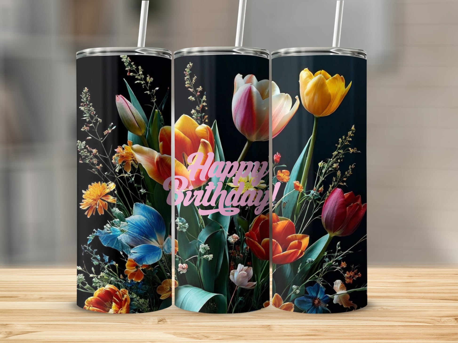 Floral birthday tumbler with pink, yellow, and orange flowers.