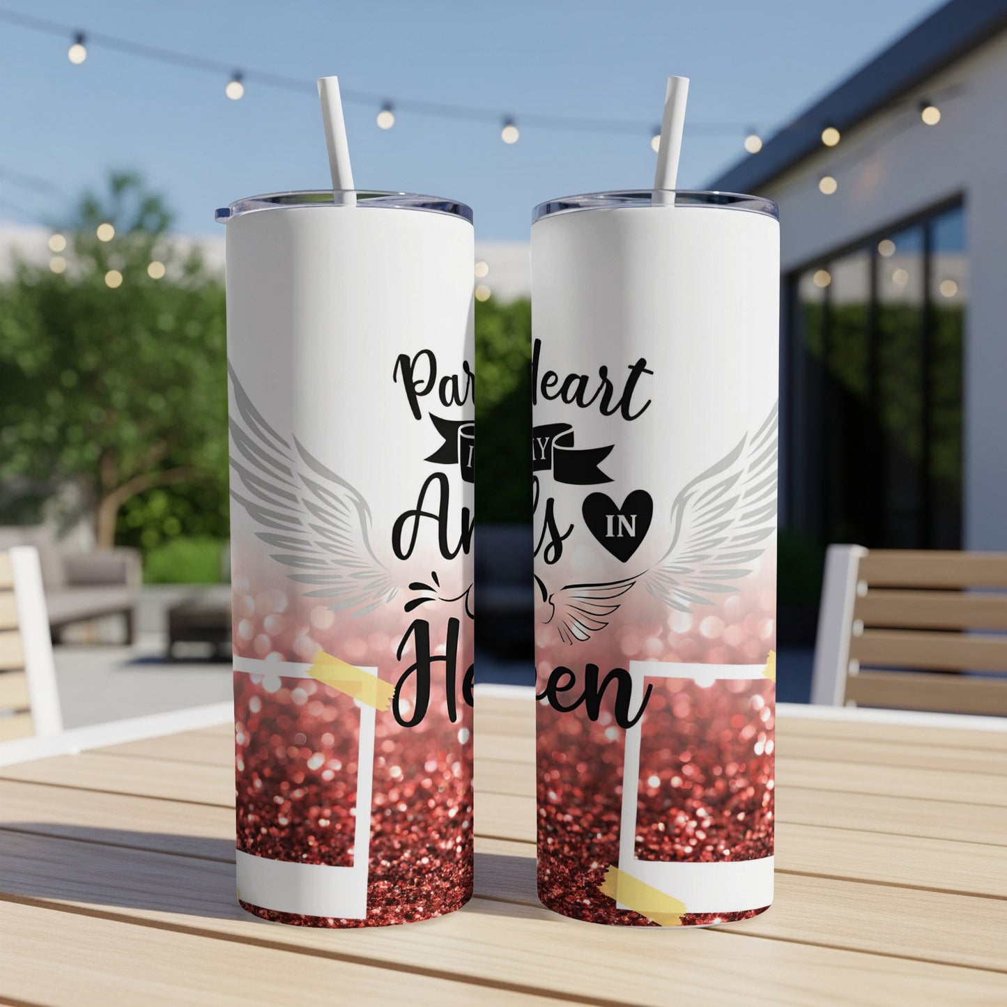 Two tumblers with "Part of my heart is in heaven" text and wings design.