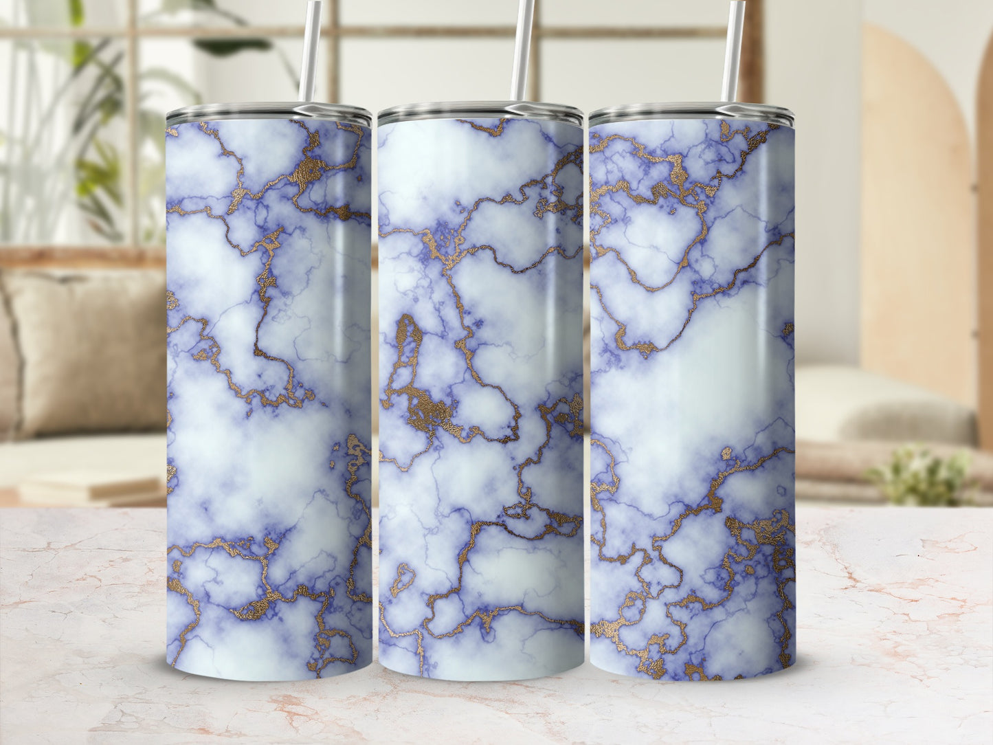 Three tumblers with a blue and gold marble pattern.