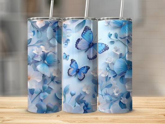 Blue and white floral pattern with butterflies on a tumbler.