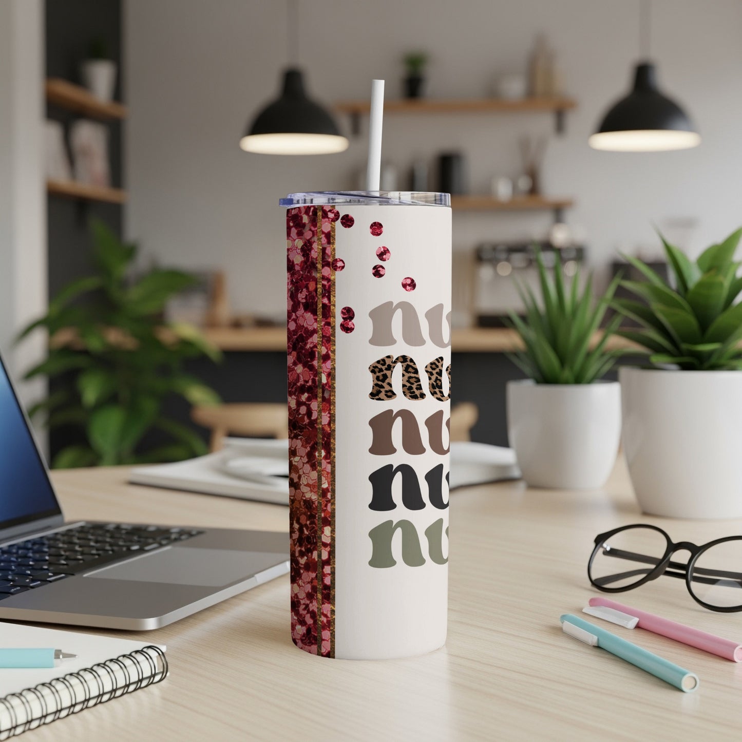 "Nurse" text on a glitter tumbler with a white lid and straw.