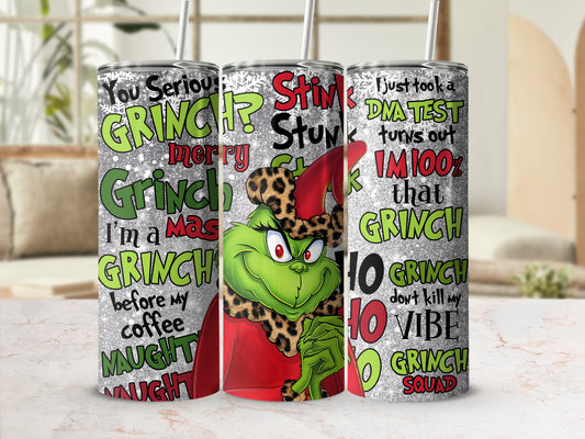 Three Grinch-themed tumblers with holiday greetings and phrases.