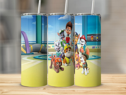 Paw Patrol characters on a yellow tumbler with a straw.