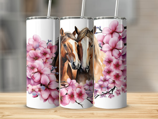 Two horses with pink cherry blossoms on a tumbler.