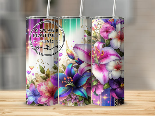 Three floral tumblers with inspirational text.