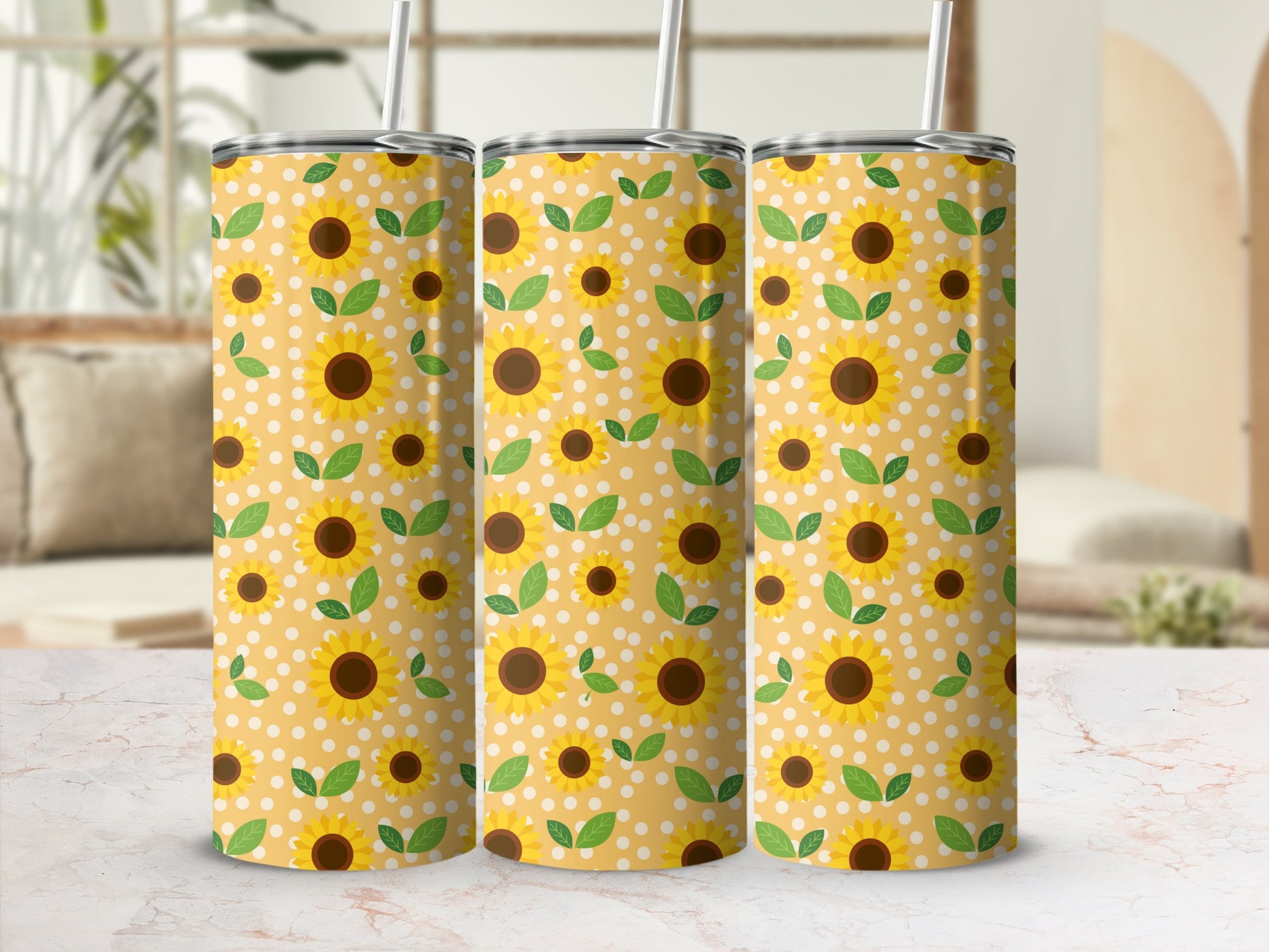 Three tumblers with a yellow background, white polka dots, and sunflowers.