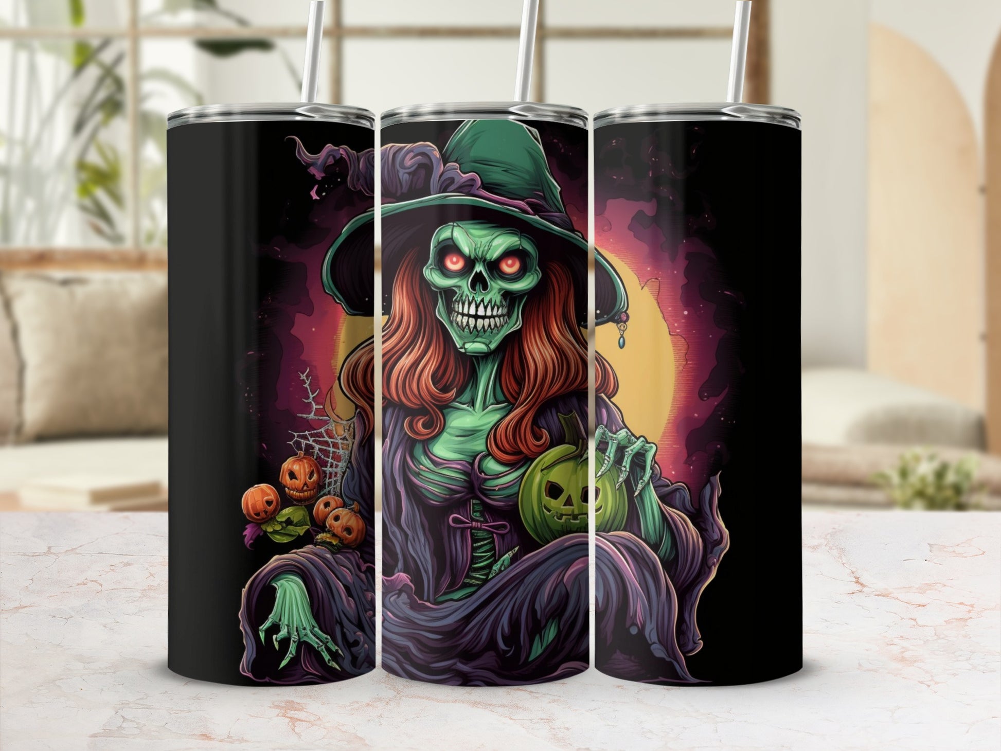 Green skeleton witch with pumpkins and jack-o-lanterns on Halloween-themed tumblers.
