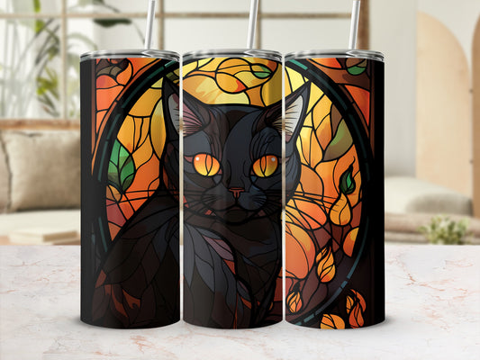 Black cat with yellow eyes in stained glass design on three tumblers.