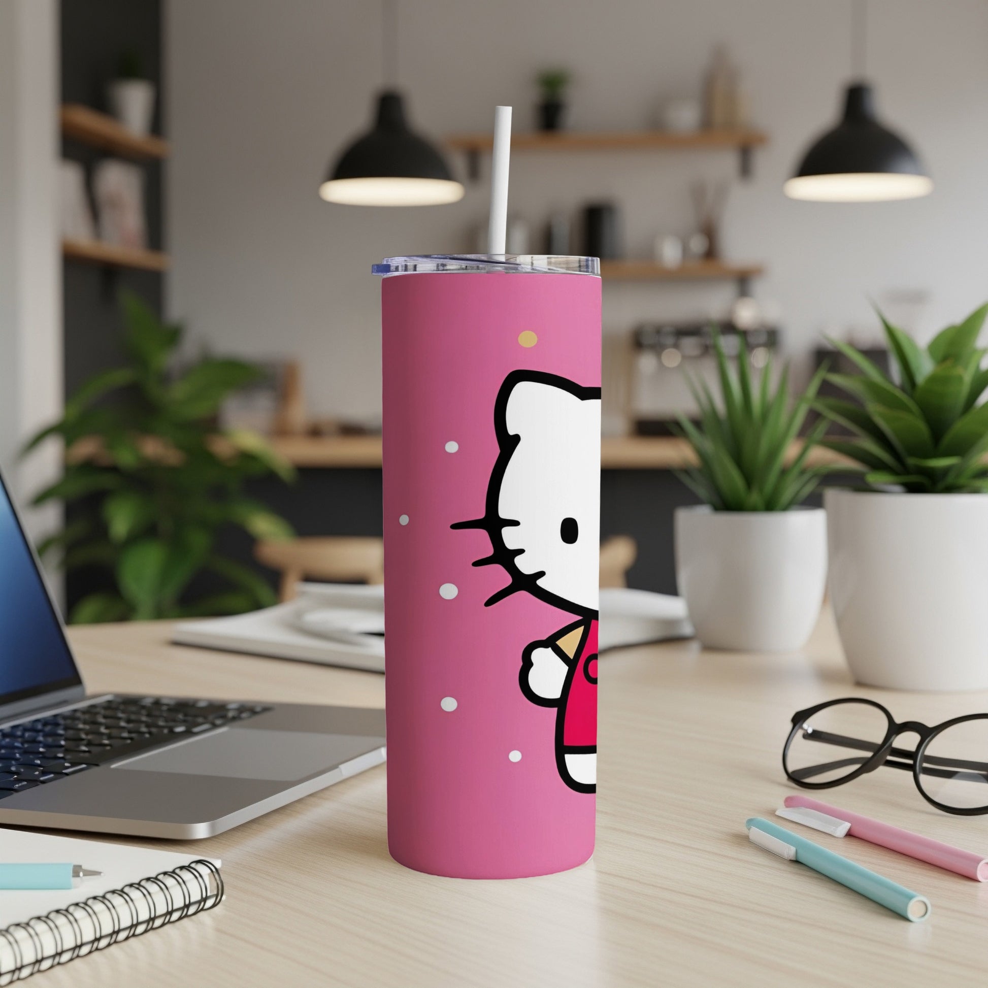Pink tumbler with Hello Kitty holding a yellow cup, with straw.