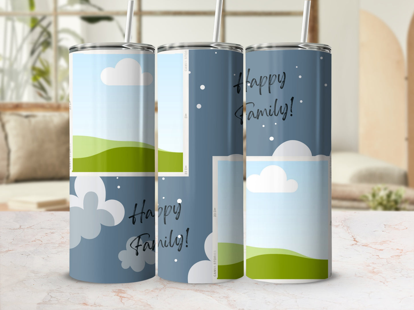 Three tumblers with a "Happy Family!" design and a sky and rolling hills graphic.
