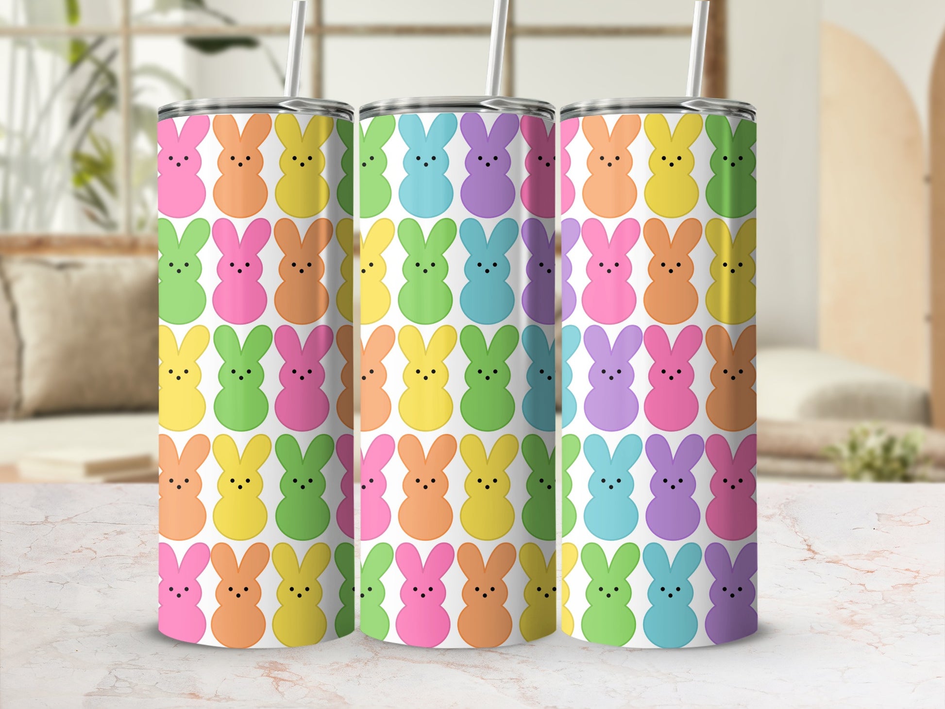 Three tumblers with a repeating bunny pattern in pastel colors.